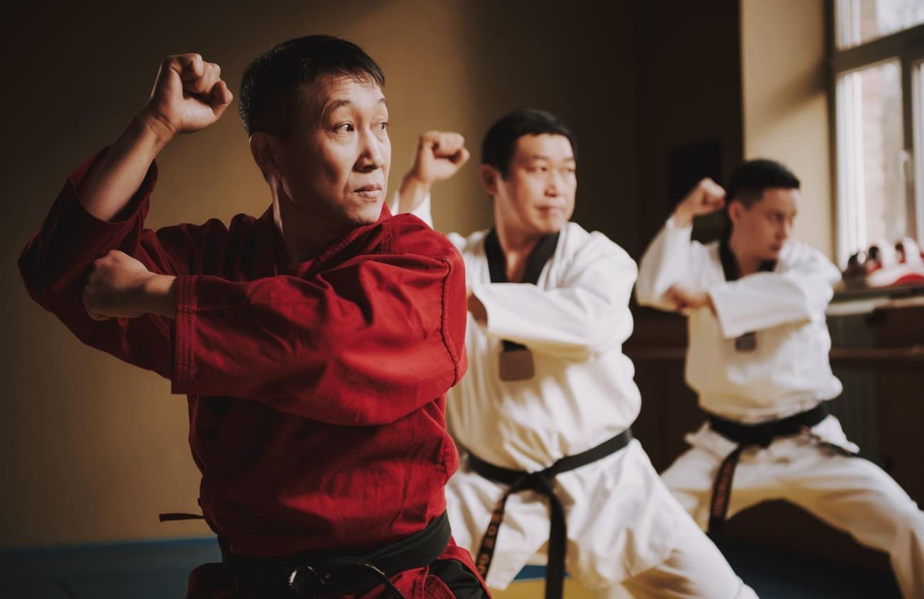 Adult Taekwondo classes provide a high-energy, full-body workout that builds strength, flexibility, and self-discipline while teaching practical self-defense skills and helping reduce stress.